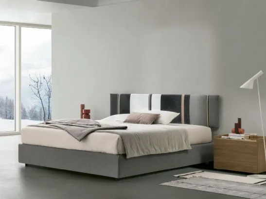 Letto sommier Diagonal con box contenitore e pannello testiera di Tomasella